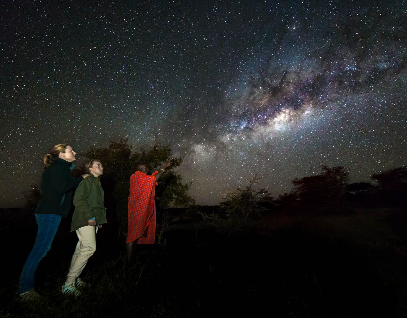 A man shows guests the milkyway