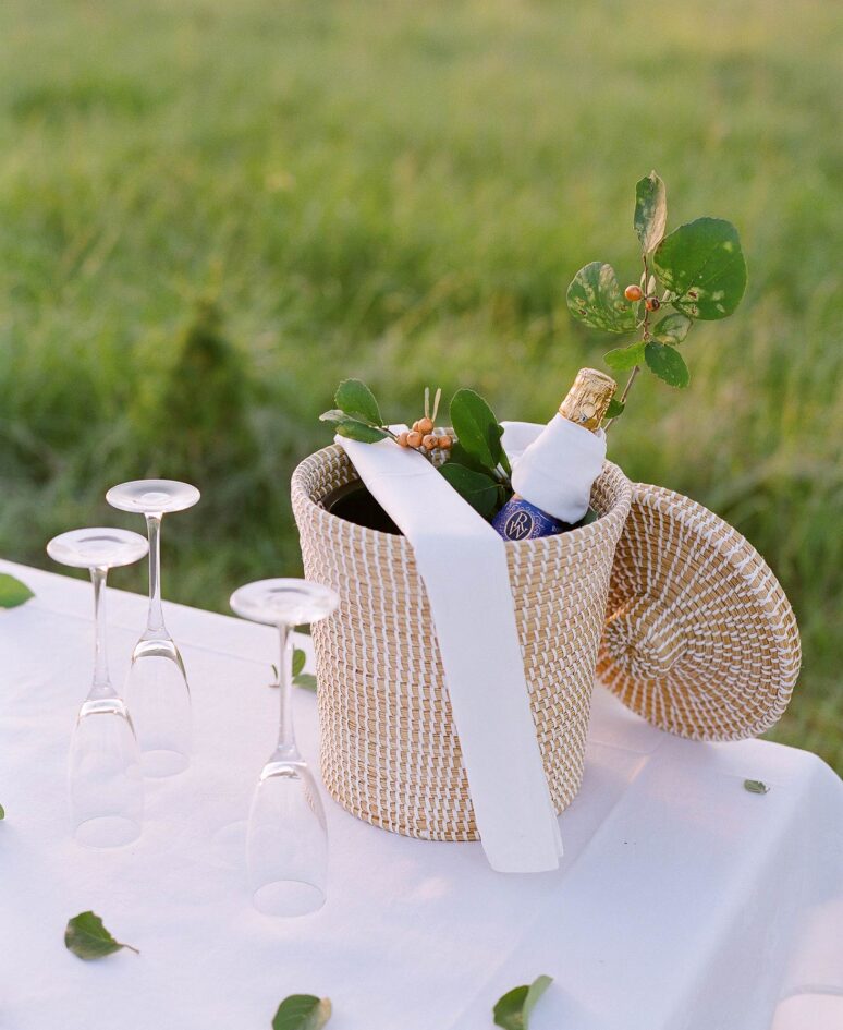 Champagne in an ice bucket on a table