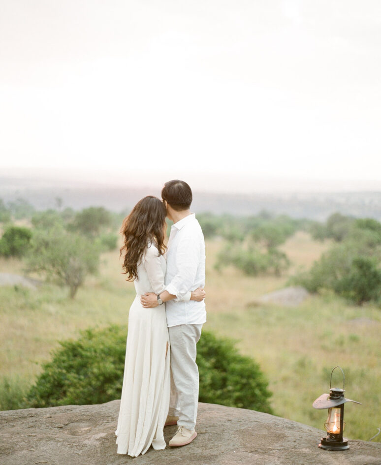 Couple looking out at the Serengeti