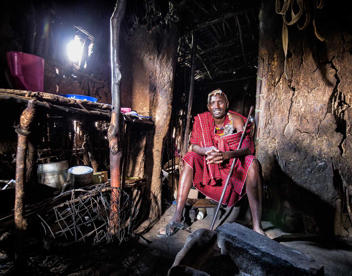 A man sits in his house