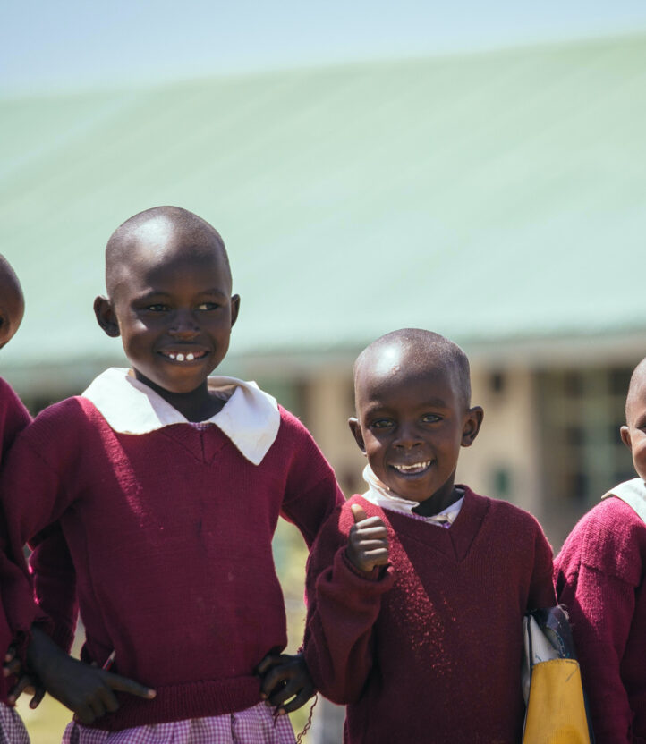 Four school children in uniform