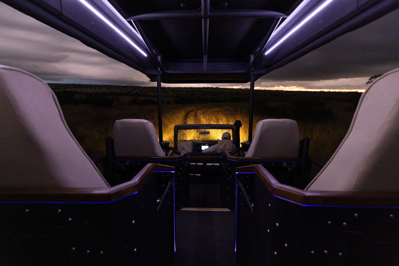 safari vehicle interior at night